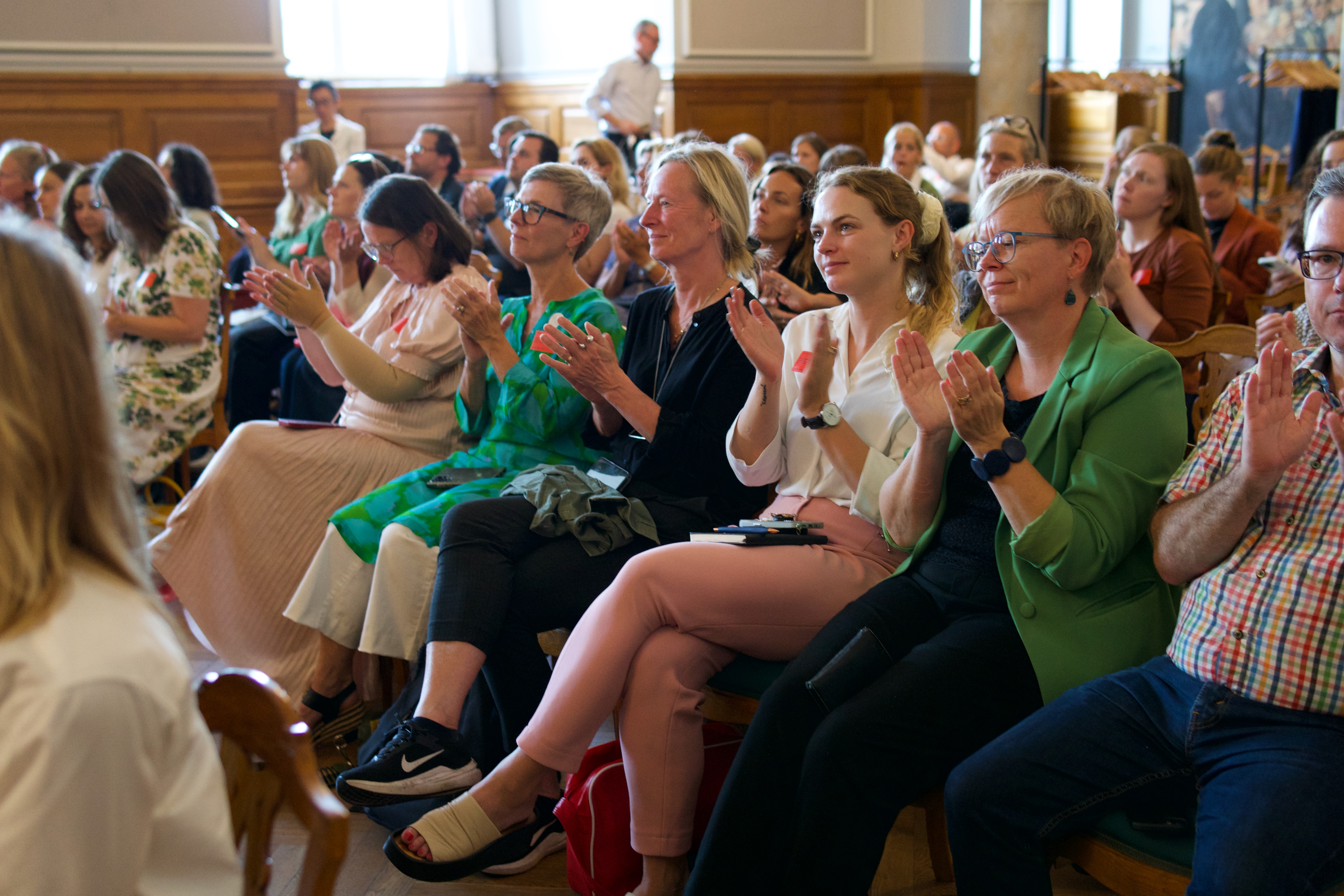 Engaged audience at the Danish Parliament